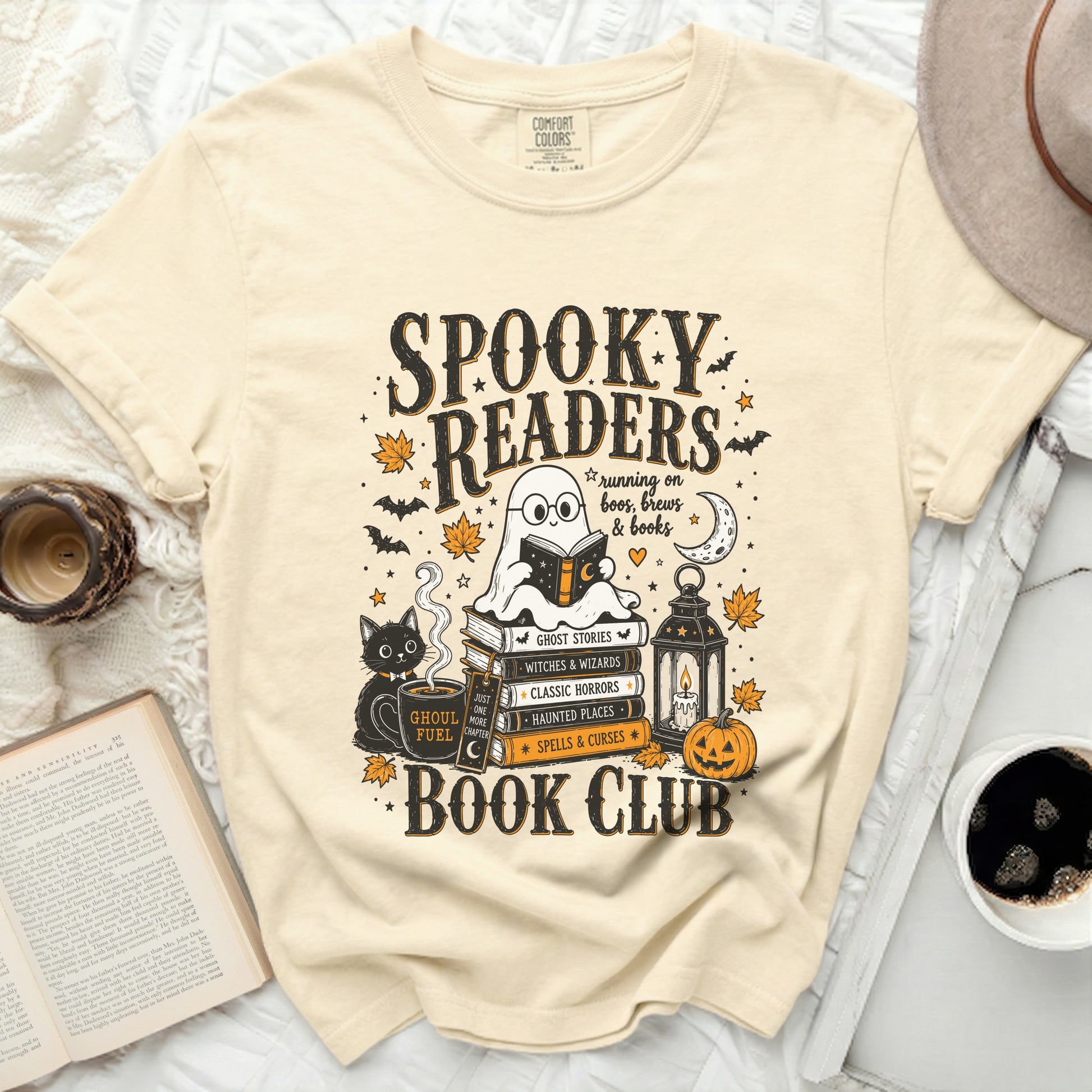 Spooky Readers Book Club graphic with ghost reading on books, cat and pumpkin.