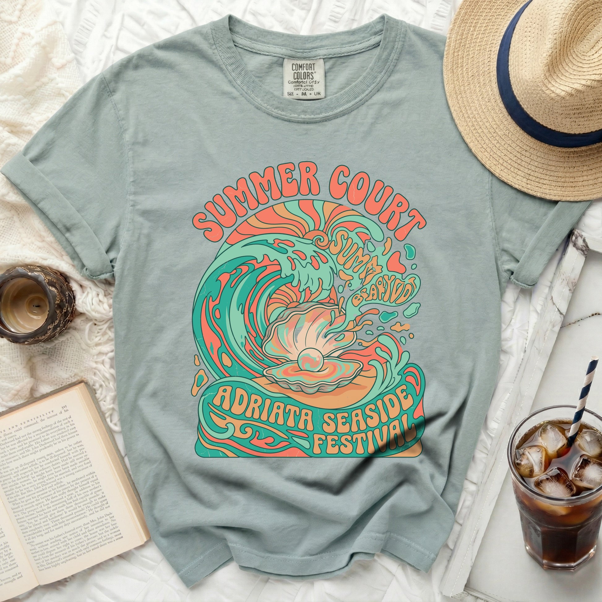 Green t-shirt with "Summer Court Adriata Seaside Festival" text and a seashell wave graphic.