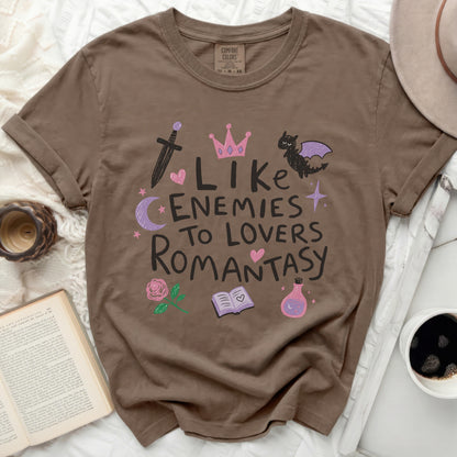 Brown t-shirt with "Like Enemies To Lovers Romantasy" graphic and fantasy icons.