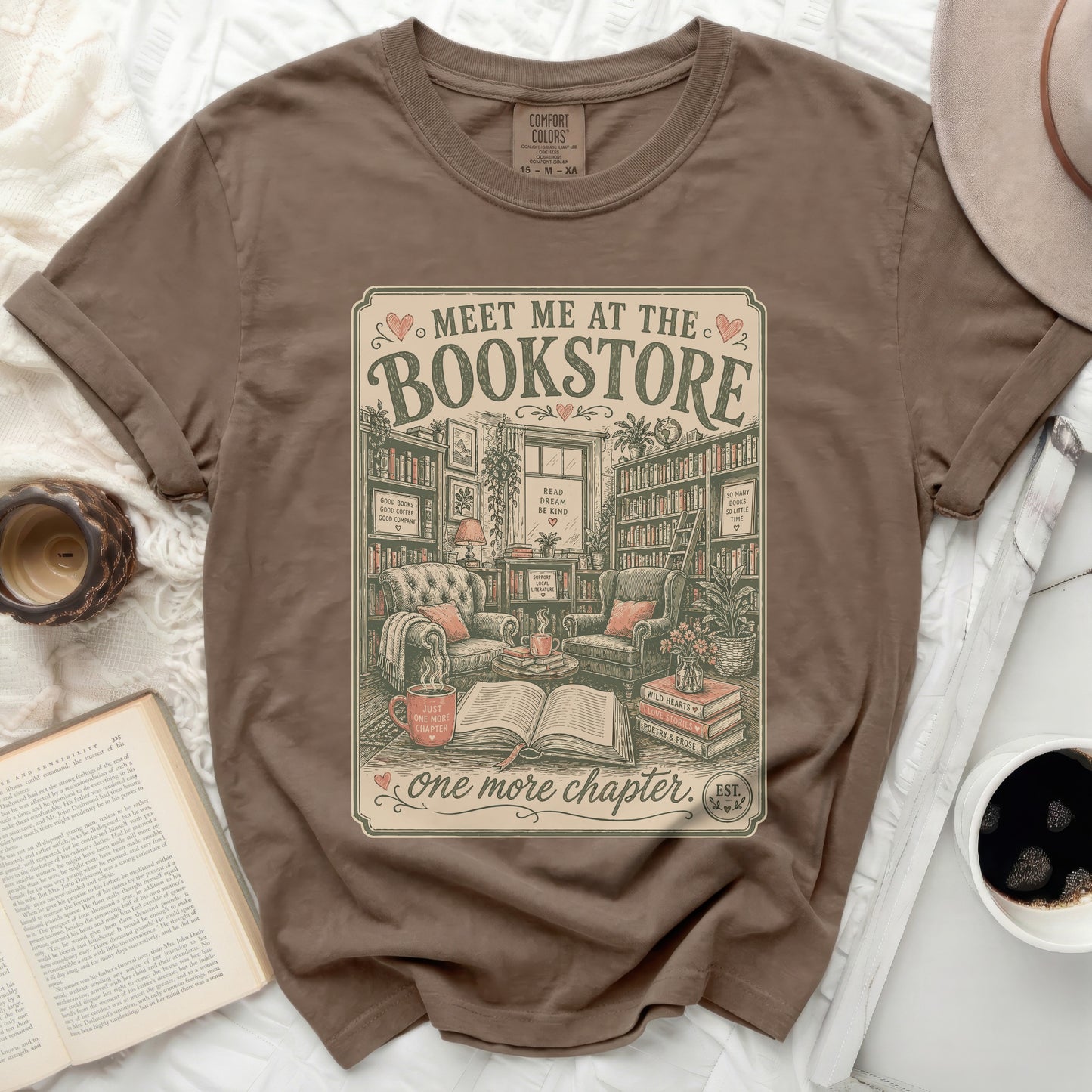 Brown t-shirt with "Meet Me At The Bookstore" vintage graphic and book-themed quotes.