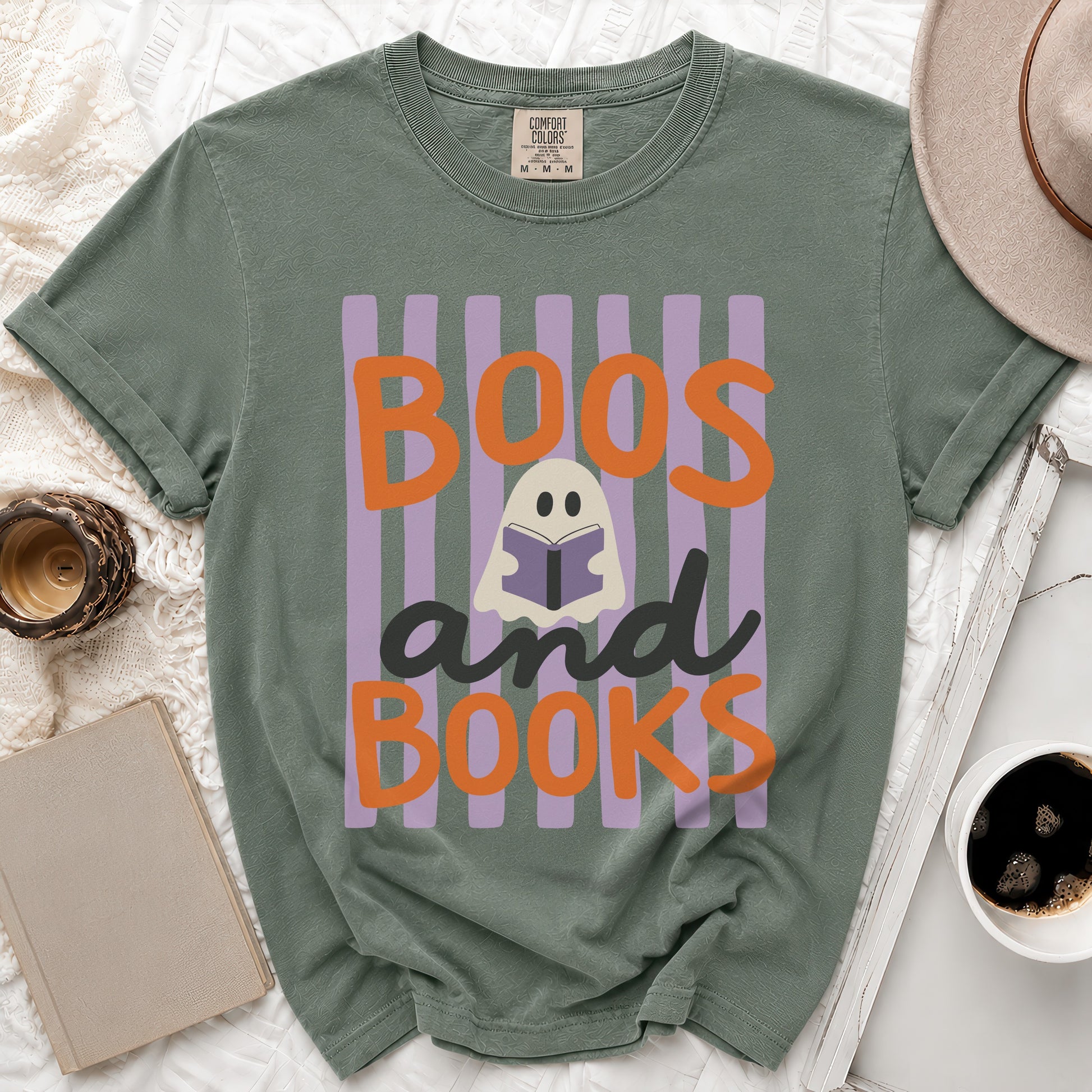 Green t-shirt with "Boos and Books" text and a ghost reading a book.