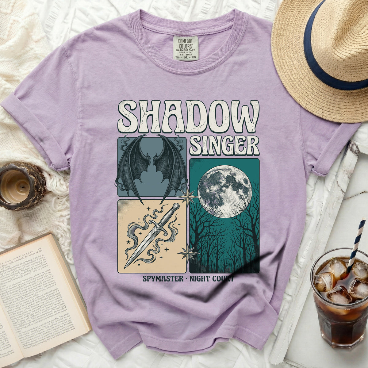 Purple t-shirt with "Shadow Singer" graphic featuring a dagger, moon, and wings.