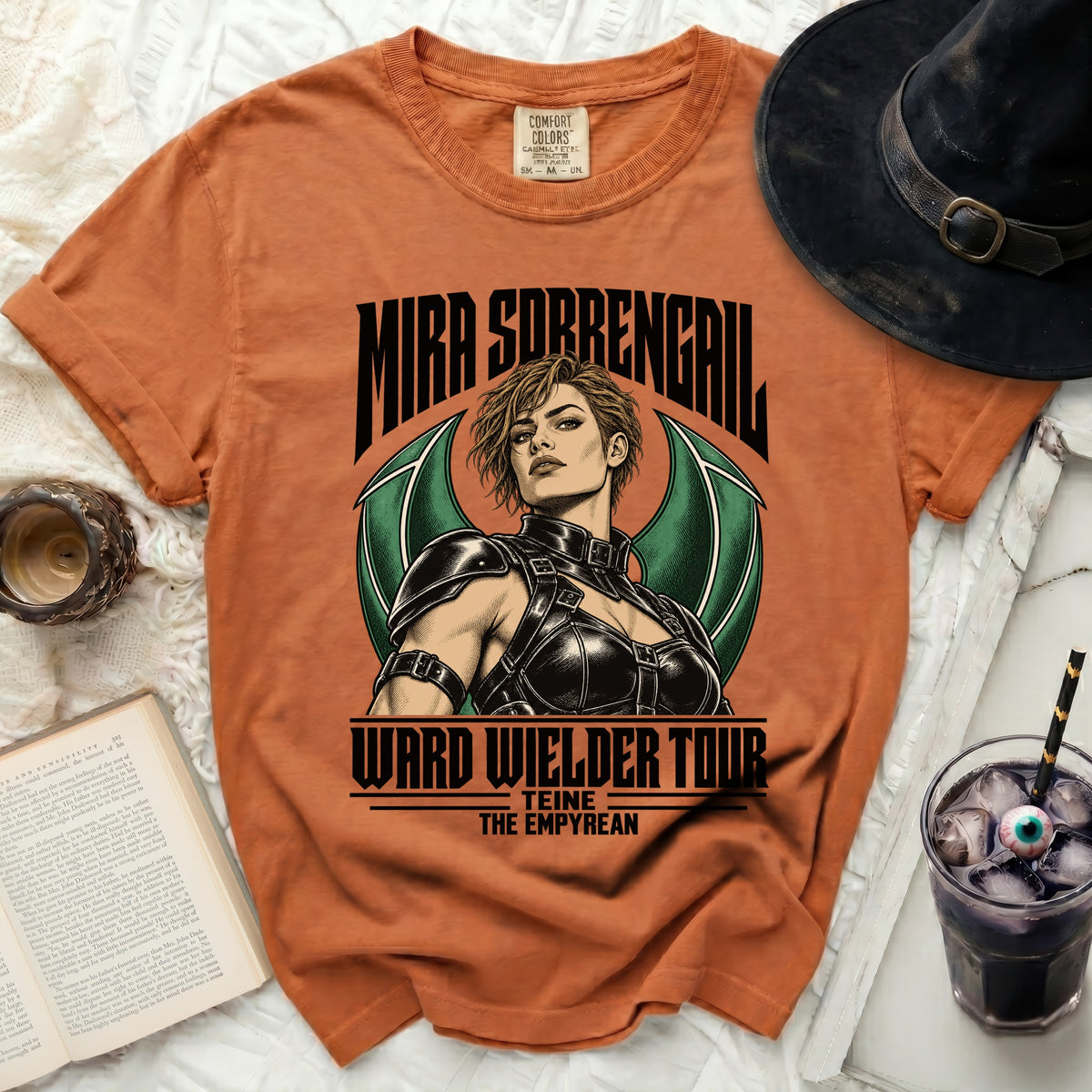 Orange t-shirt featuring Mira Sorrengail artwork and tour text.