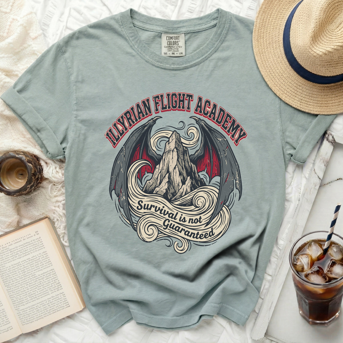T-shirt with "Illyrian Flight Academy Survival is not Guaranteed" graphic featuring dragon wings.