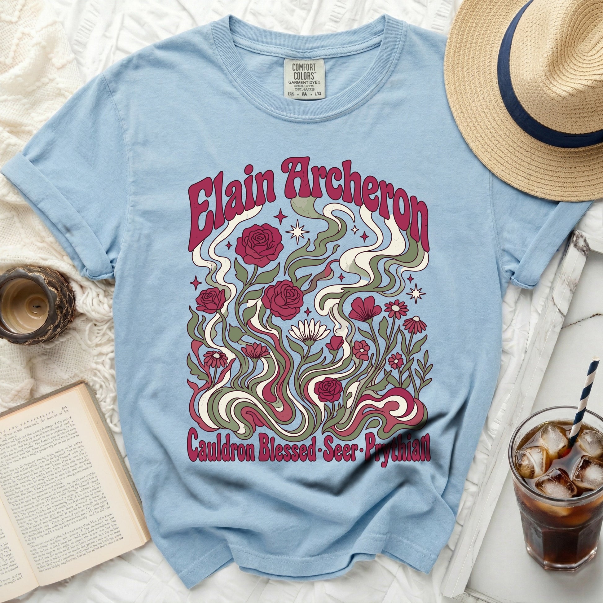 Light blue t-shirt with Elain Archeron design, roses, and text.