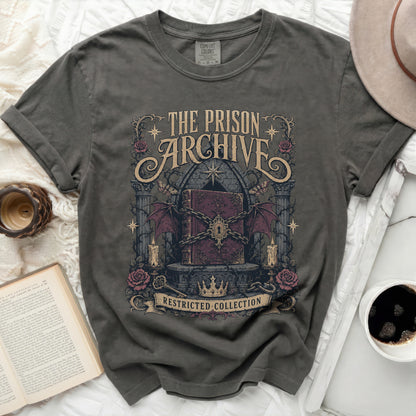 The Prison Archive Restricted Collection graphic on a dark grey t-shirt.