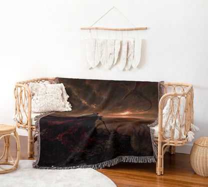 a cozy living room with a wicker bench, a woven basket, and a woven rug. The bench is adorned with a dark blanket featuring a dragon design, and the wall behind it has a hanging white feather decoration.