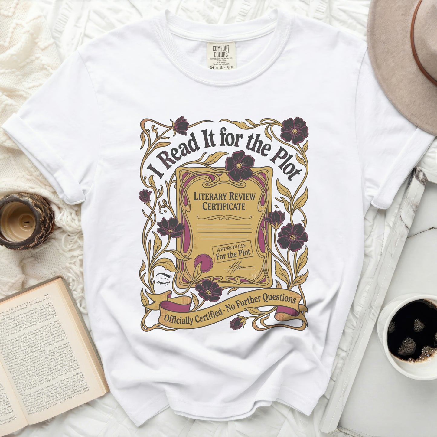 White t-shirt with "I Read It for the Plot" literary review certificate graphic.