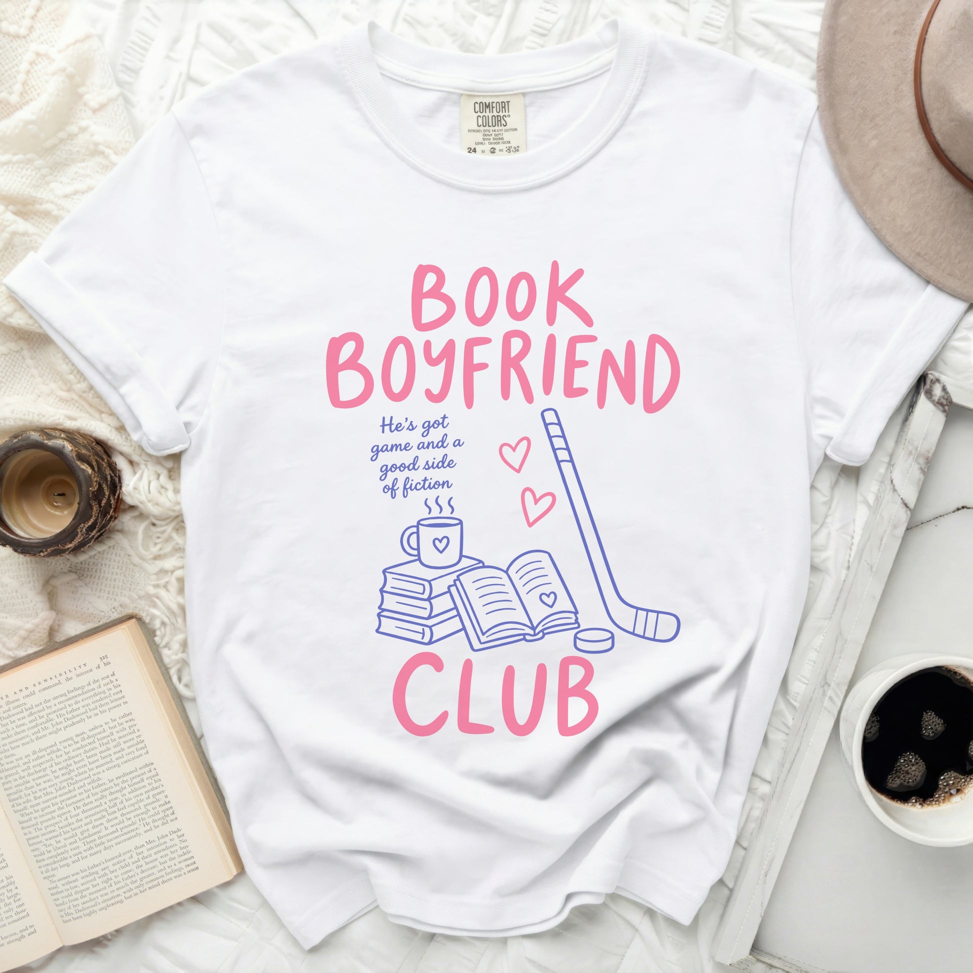 White t-shirt with "Book Boyfriend Club" text and book/hockey graphic.