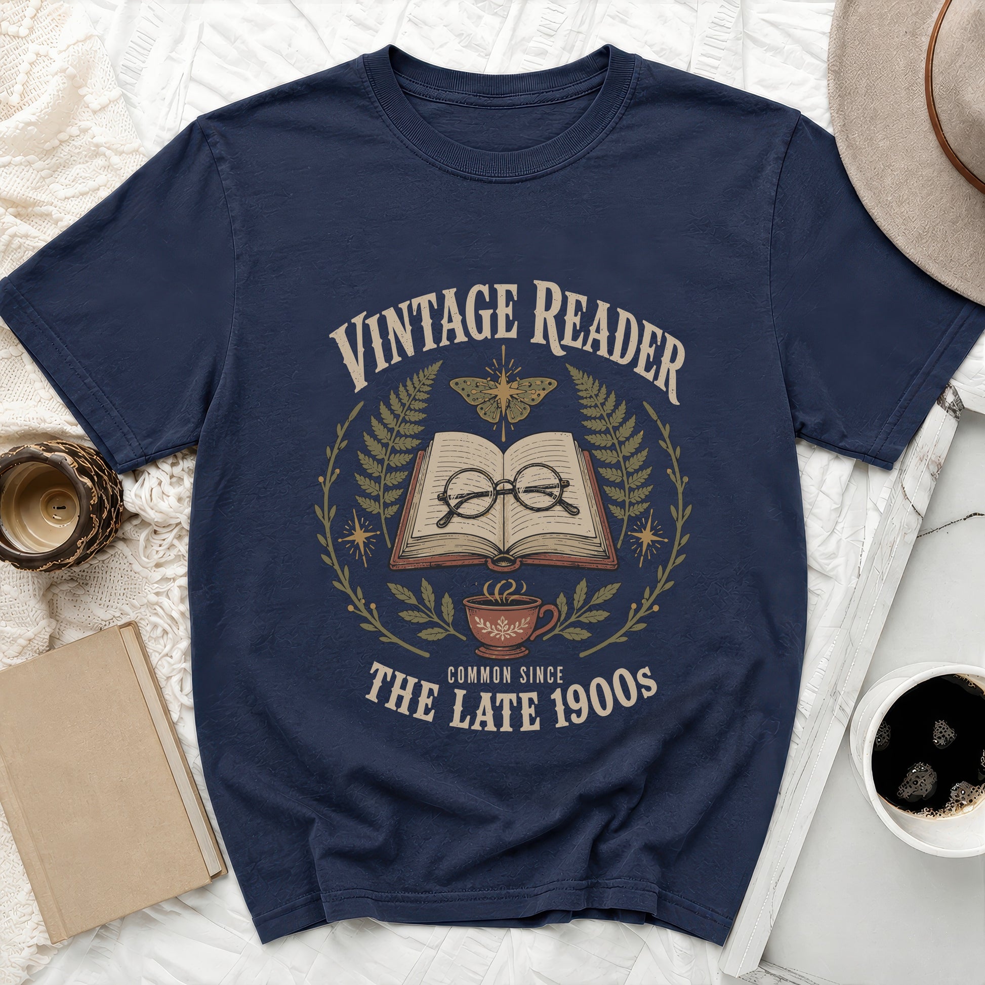 Navy t-shirt with "Vintage Reader Common Since The Late 1900s" text and book graphic.