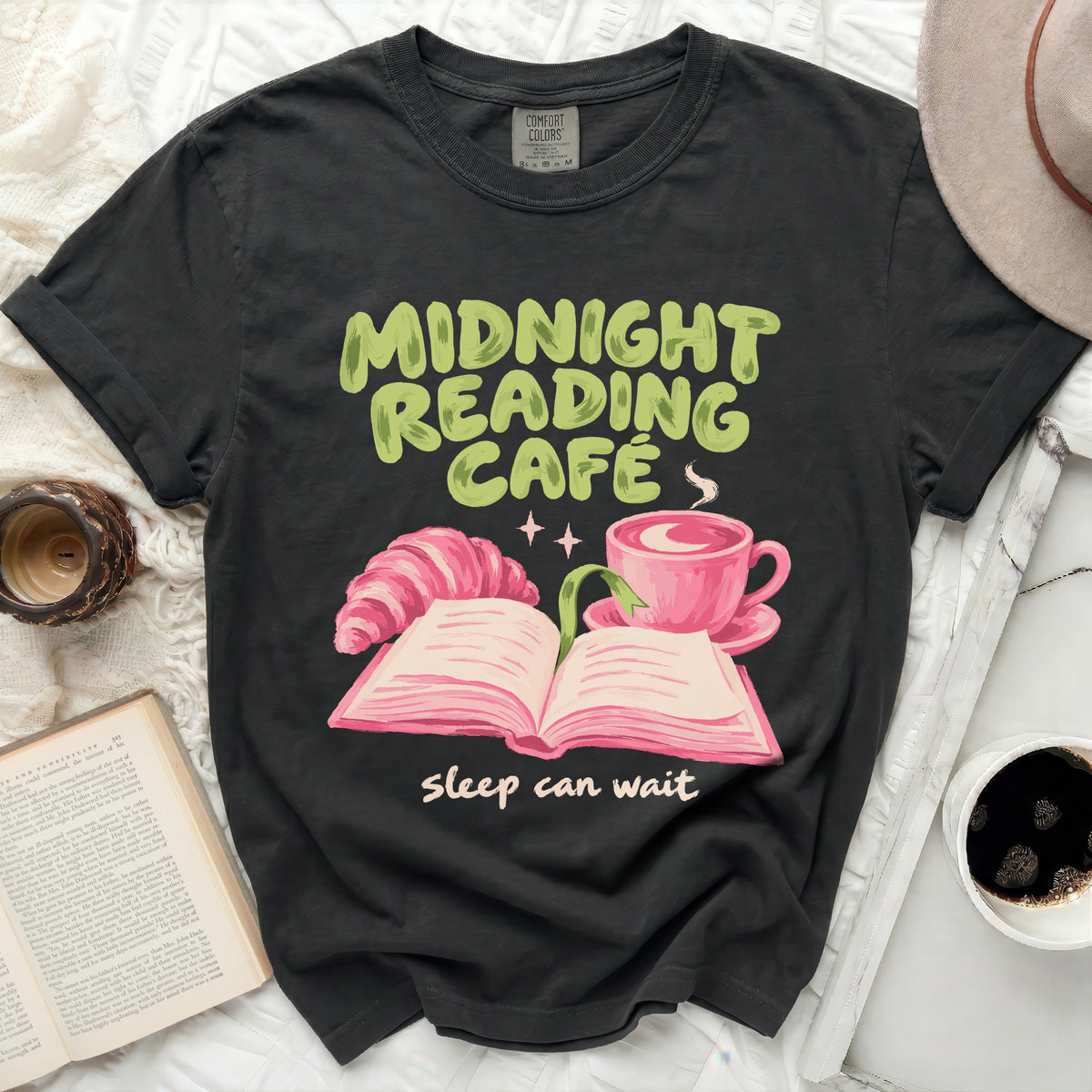 Black t-shirt with "Midnight Reading Cafe sleep can wait" graphic.