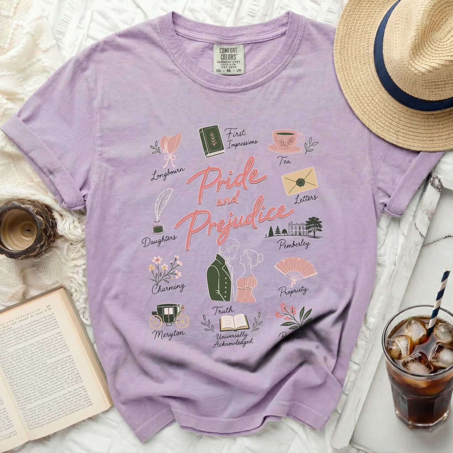 Purple t-shirt with "Pride and Prejudice" and illustrations of literary elements.