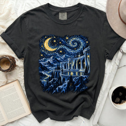 Dark t-shirt with a starry night landscape and castle design.