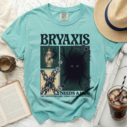 Bryaxis graphic tee with lantern, chains, and shadowy figure.