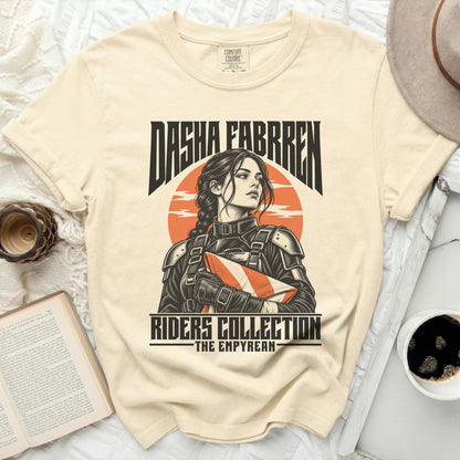 Cream t-shirt featuring "Dasha Fabrre" and "Riders Collection - The Empyrean" with a graphic.