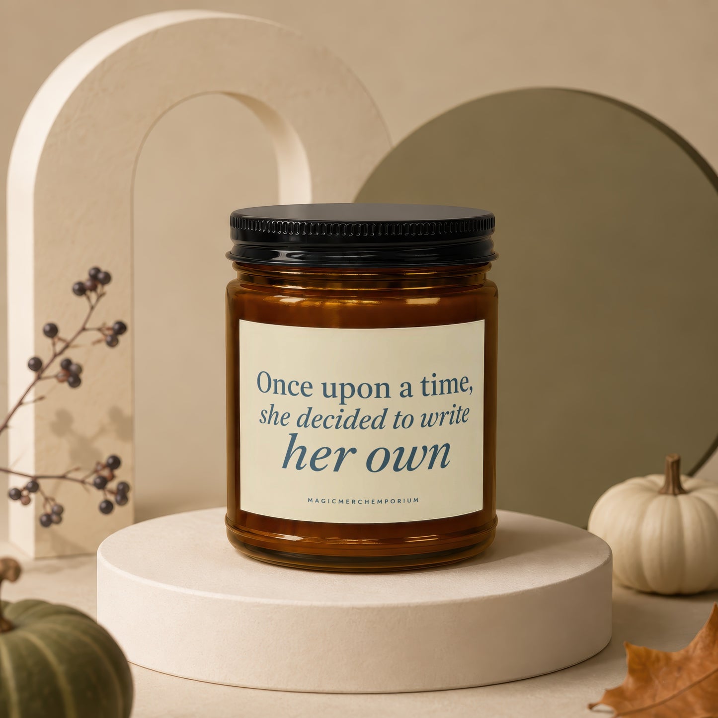 Amber candle with "Once upon a time, she decided to write her own" text.