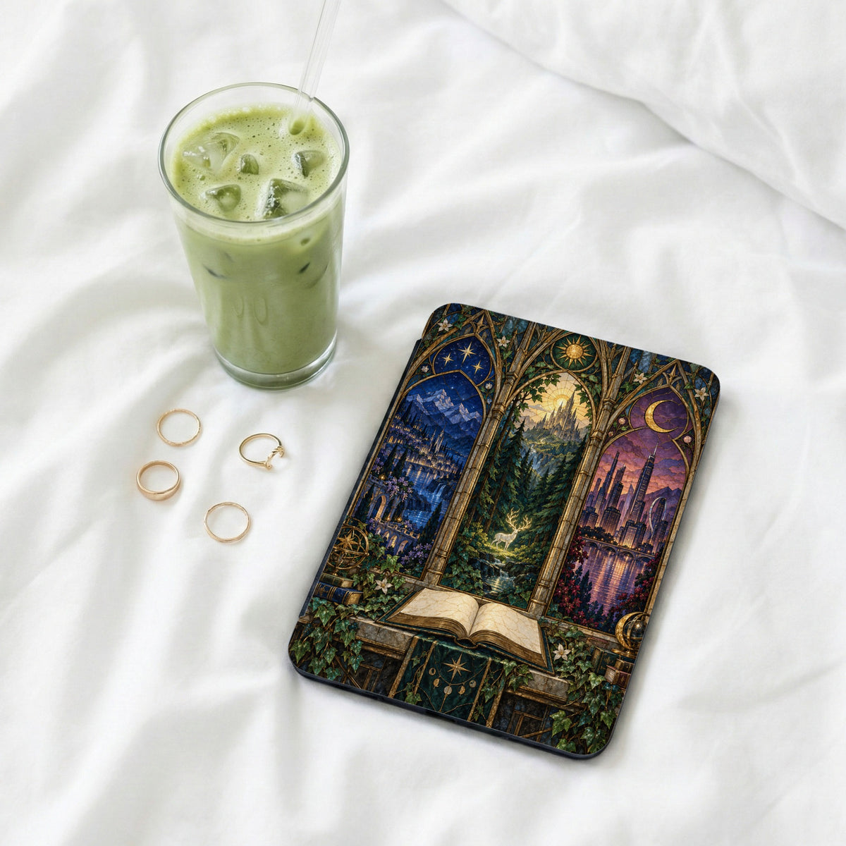 E-reader case with a stained-glass style print depicting castles, a forest, and a city.