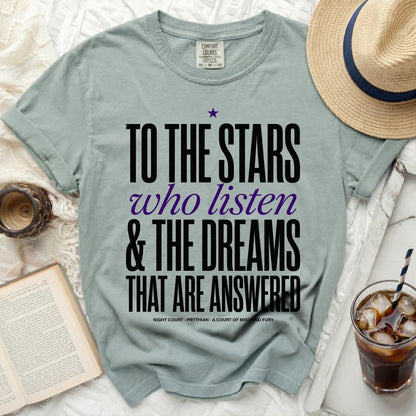T-shirt with text "To the Stars who listen & The Dreams That Are Answered".