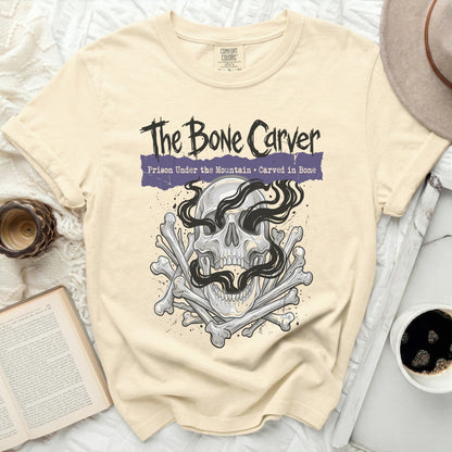 The Bone Carver graphic t-shirt with skull and bones.
