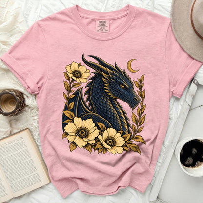 Pink t-shirt with a dark blue dragon and yellow flowers design, featuring a Comfort Colors tag.