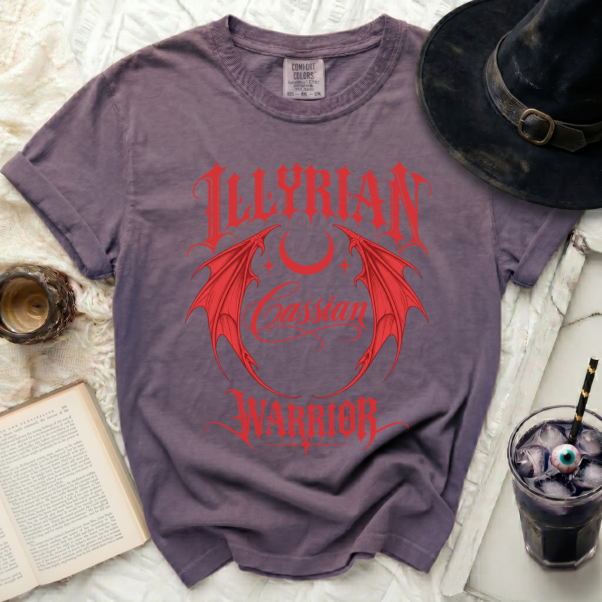 Purple t-shirt with red "Illyrian Cassian Warrior" graphic.