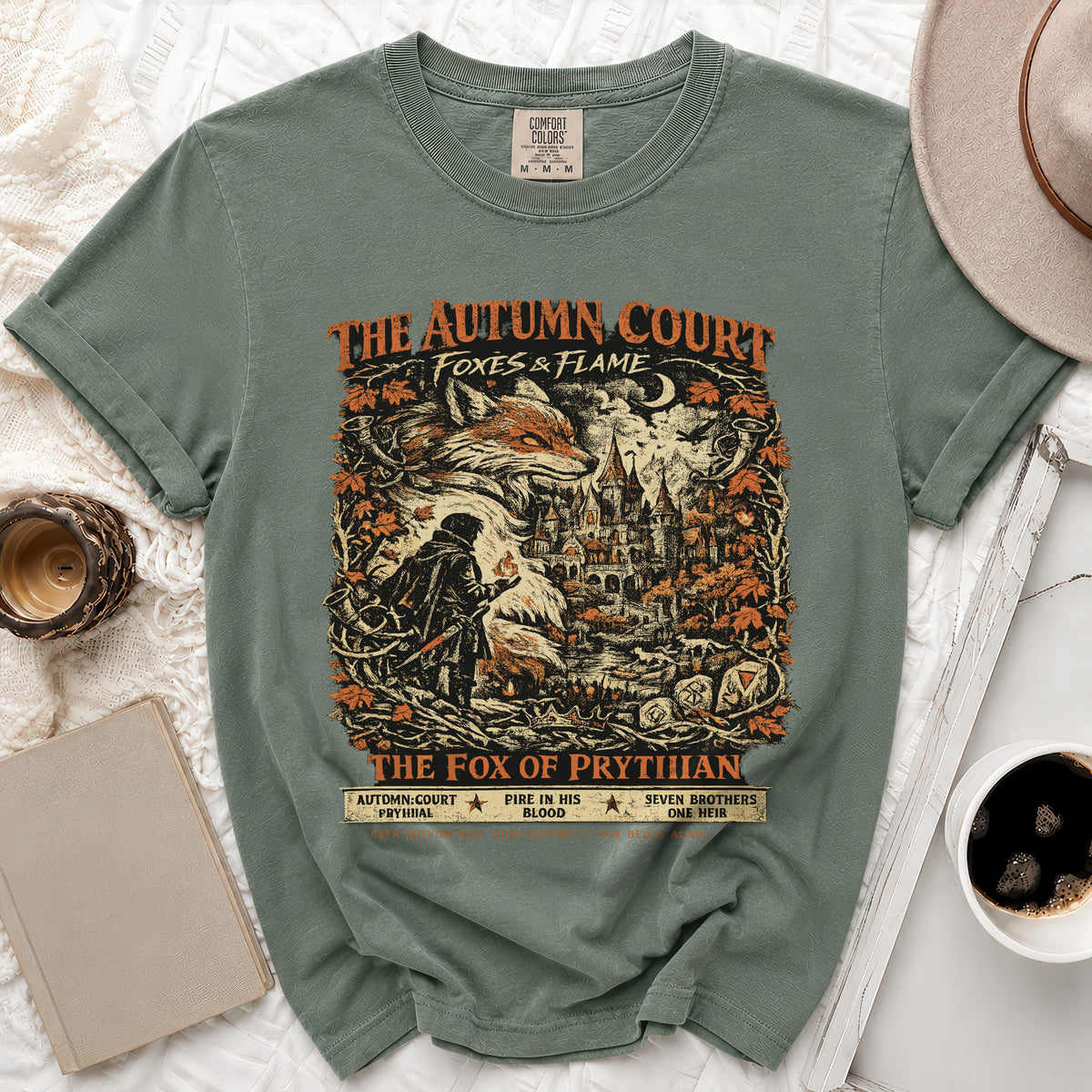 Green t-shirt with "The Autumn Court Foxes & Flame" and "The Fox of Prytian" graphic.