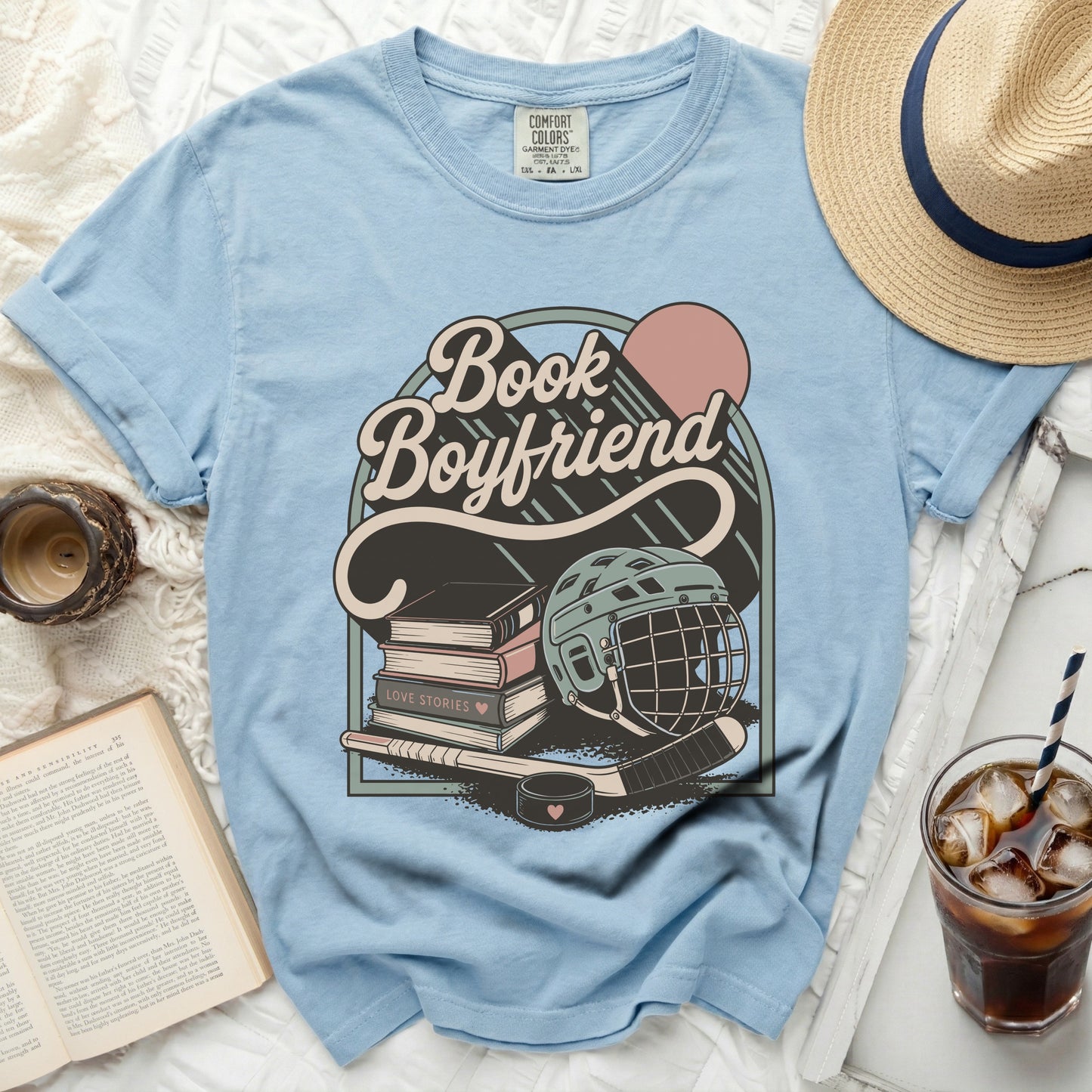 Light blue t-shirt with "Book Boyfriend Love Stories" text and hockey graphics.