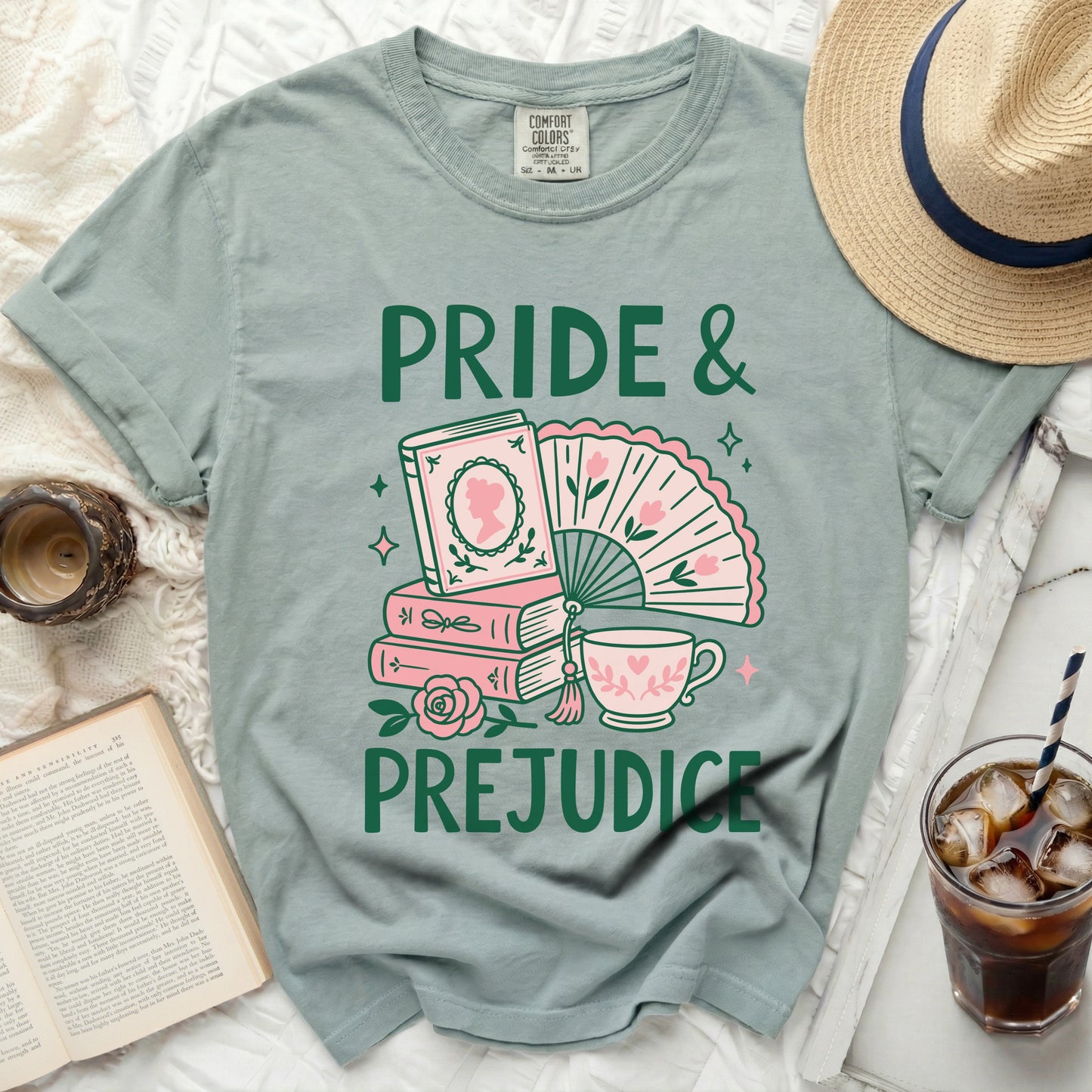 Pride and Prejudice graphic tee with books, fan, and teacup.