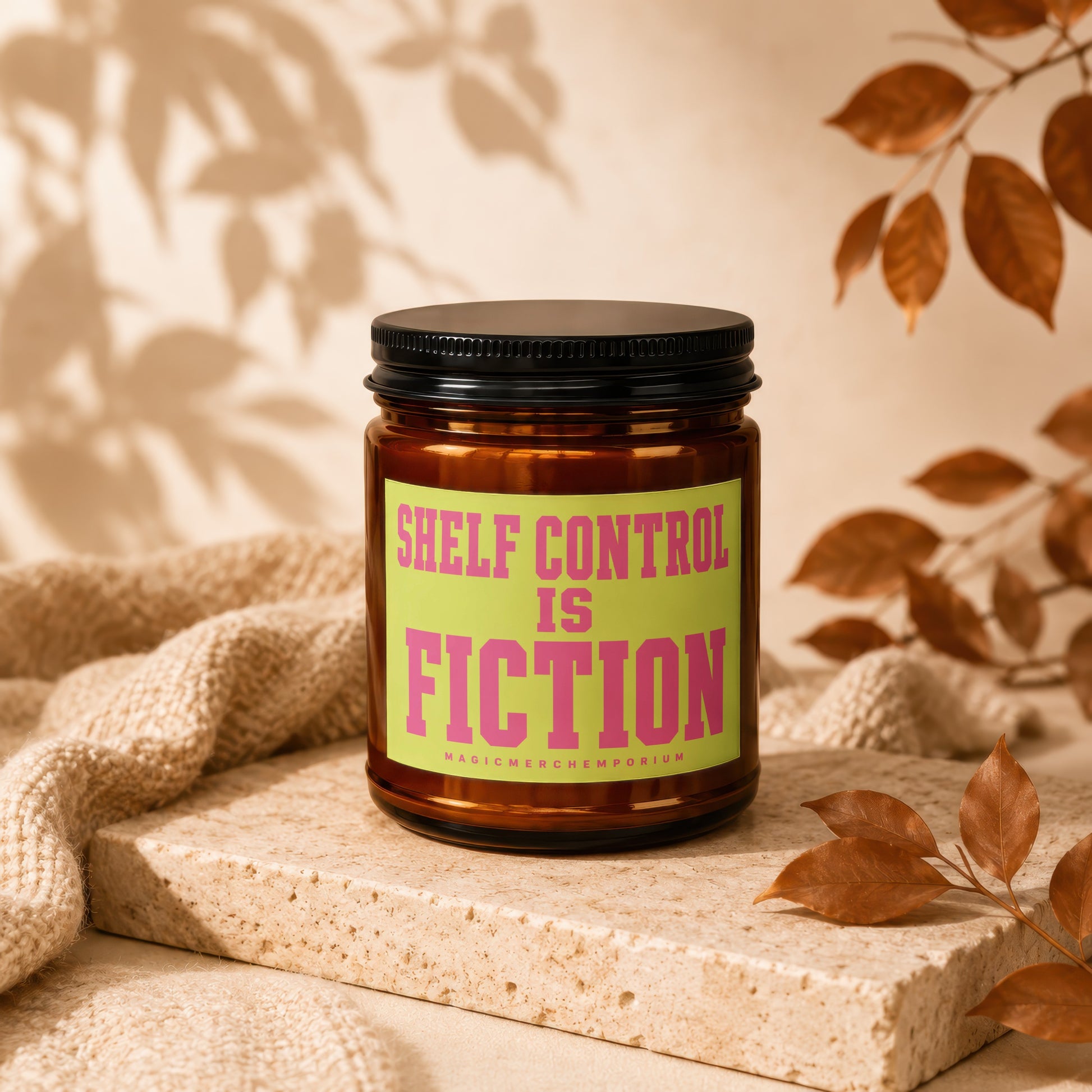 Candle with black lid, text "Shelf Control Is Fiction" on lime green label.