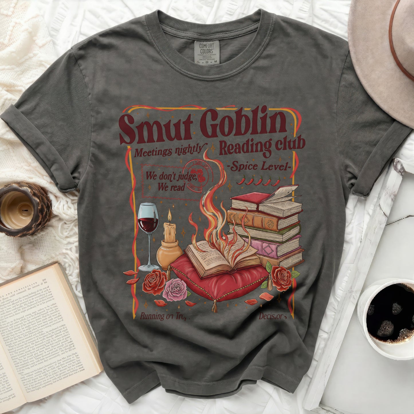 Smut Goblin Reading Club t-shirt with flame, books, roses, and wine graphic.