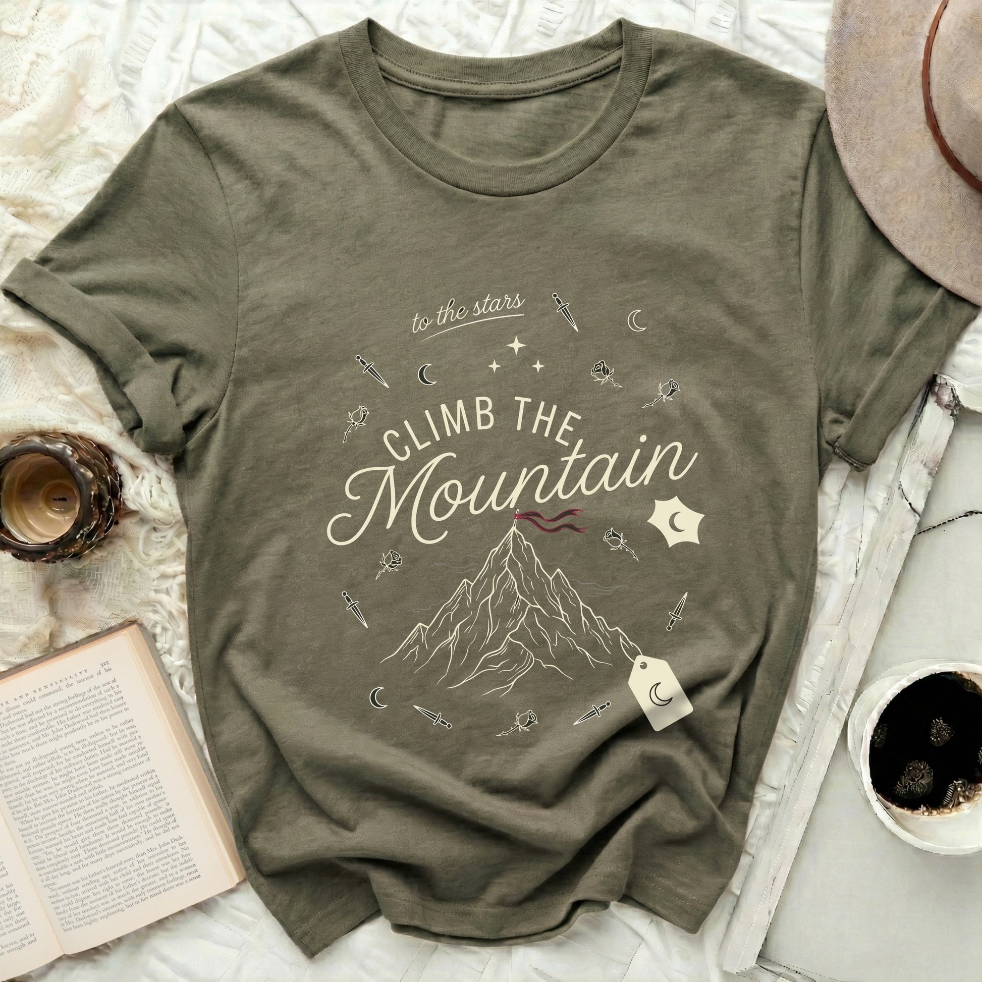 to the stars CLIMB THE Mountain Stars Moon Daggers Roses t-shirt

Graphic Tee
Mountain Shirt
Celestial Design
Stars Moon
Adventure Top
Climb Mountain
Dagger Rose
Inspirational Tee
Olive Green
Khaki Shirt
Nature Lover
Outdoor Apparel
Unique Graphic
Crewneck T-shirt
Short Sleeve
Fantasy Art
Mystical Clothing
Wanderlust Gift
Trendy Shirt
Quote Shirt