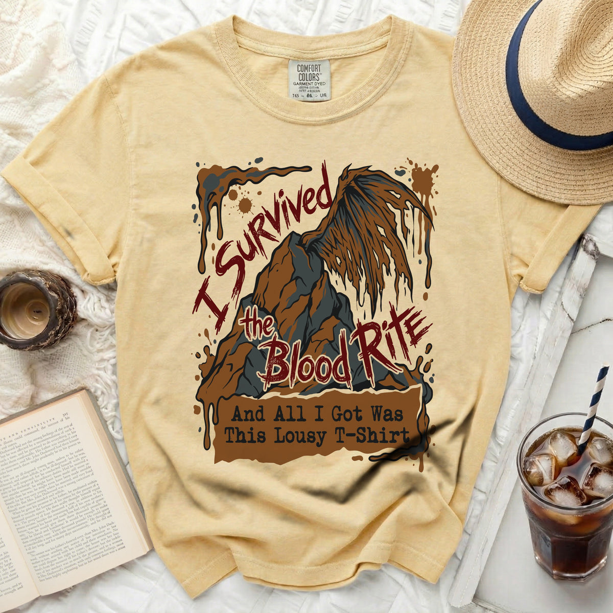Yellow t-shirt with "I survived the Blood Rite and all I got was this lousy t-shirt" graphic.