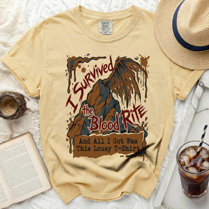 Yellow t-shirt with "I survived the Blood Rite and all I got was this lousy t-shirt" graphic.