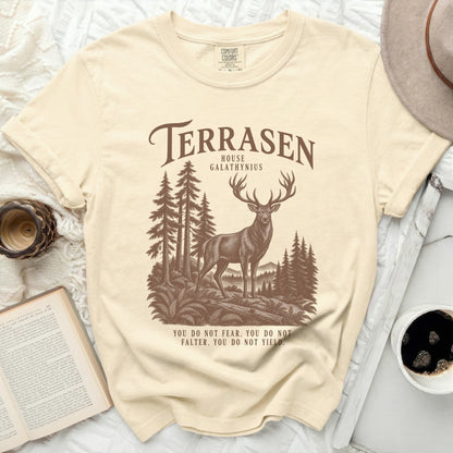 Cream t-shirt with "Terrasen House Galathynius" and a stag in a forest.