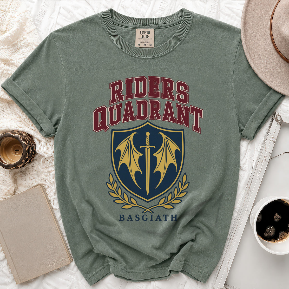 Green t-shirt with Riders Quadrant logo featuring sword and wings, and Basgiath text.