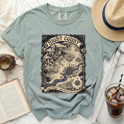 Light blue t-shirt with a map design for "Night Court" and "Terra Incognita" text.