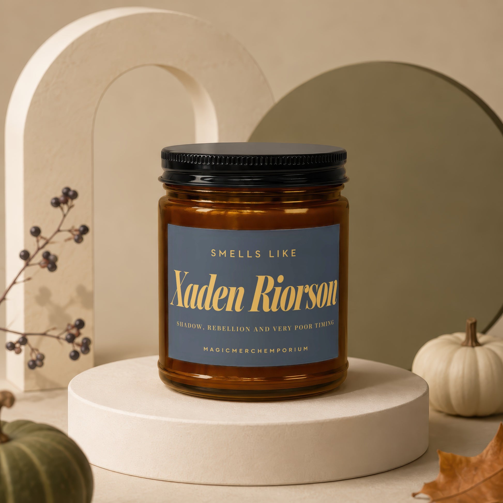 Amber jar candle labeled "Xaden Riorson, Shadow, Rebellion and Very Poor Timing".