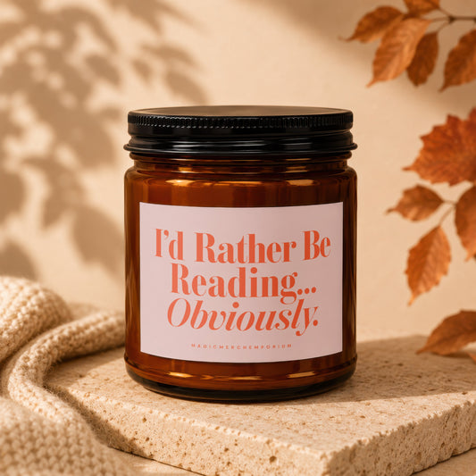 Amber jar candle with white label that reads "I'd Rather Be Reading... Obviously."