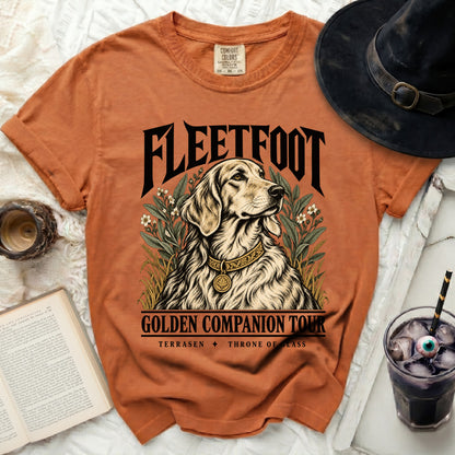 Orange t-shirt with "FLEETFOOT GOLDEN COMPANION TOUR TERRASEN THRONE OF GLASS" and dog graphic.