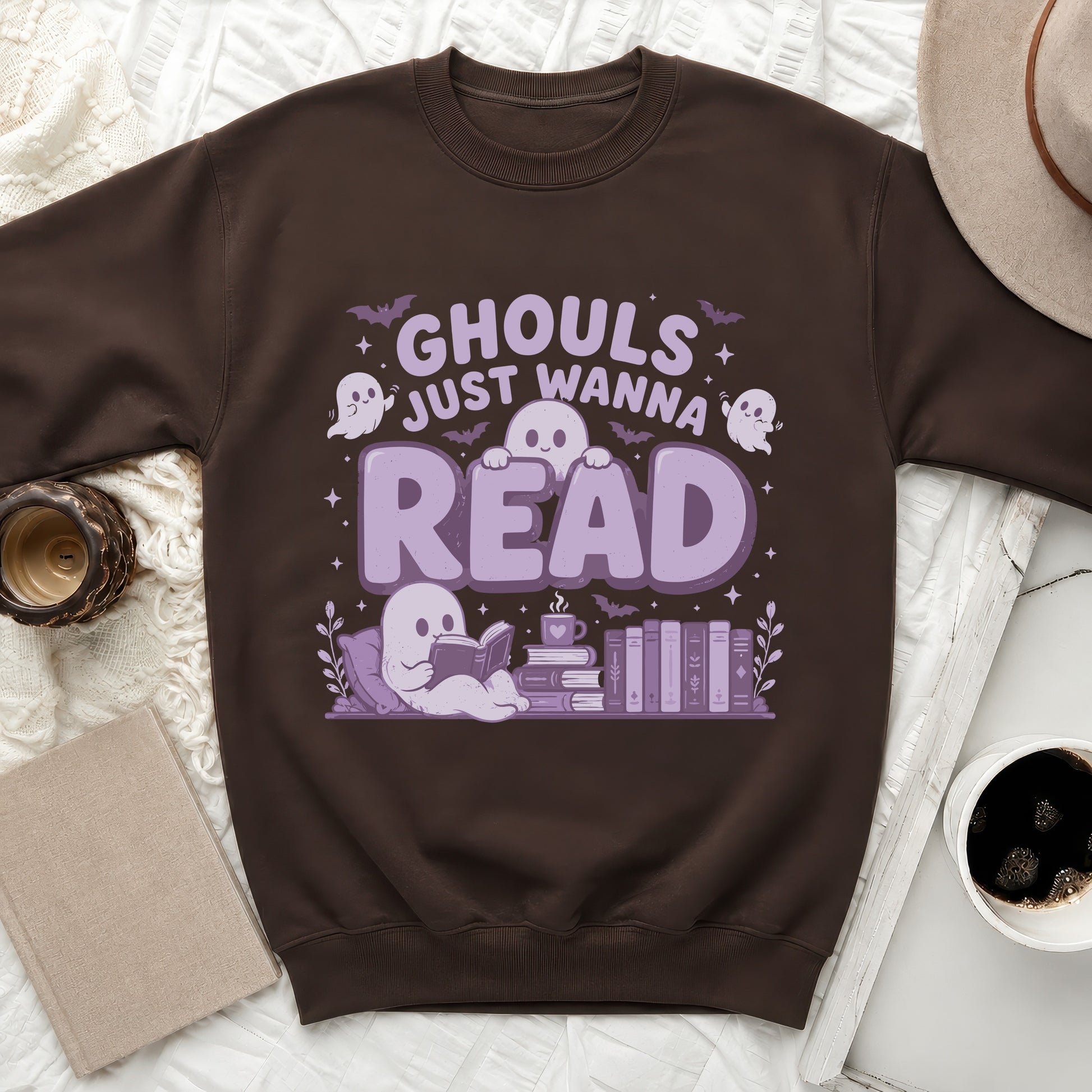 Brown sweatshirt with "Ghouls Just Wanna Read" graphic featuring cute ghosts and books.