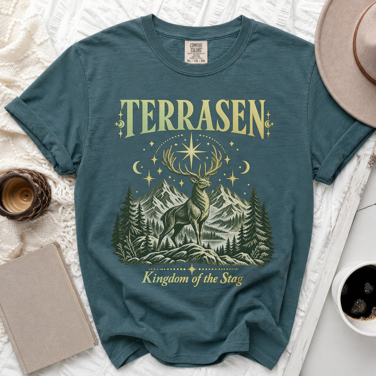 Teal t-shirt with "TERRASEN Kingdom of the Stag" text and stag graphic.