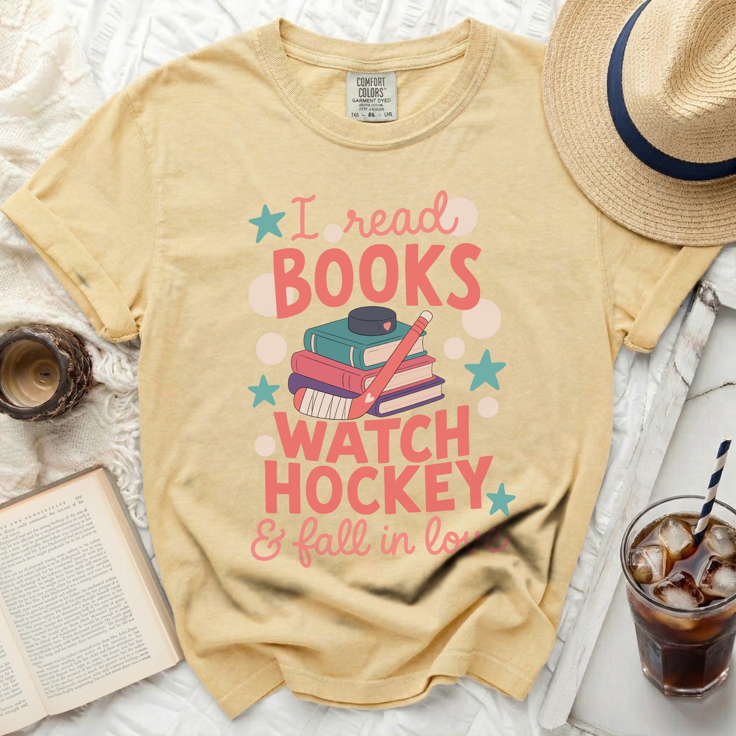 Yellow t-shirt with text "I read BOOKS WATCH HOCKEY & fall in love".