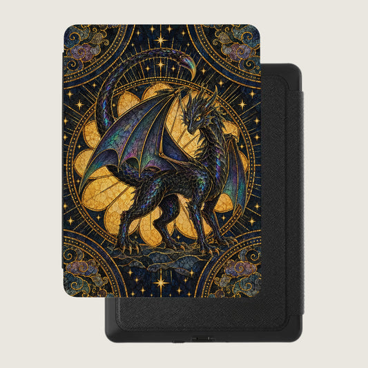 Black e-reader case featuring an intricate stained-glass style illustration of a golden-eyed dragon against a starry, geometric background.