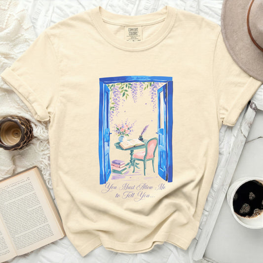Cream t-shirt with blue door graphic featuring writing desk and wisteria.