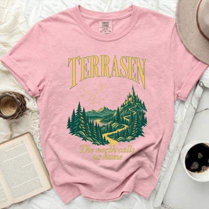 Pink t-shirt with "TERRASEN The north calls us home" and mountain landscape graphic.