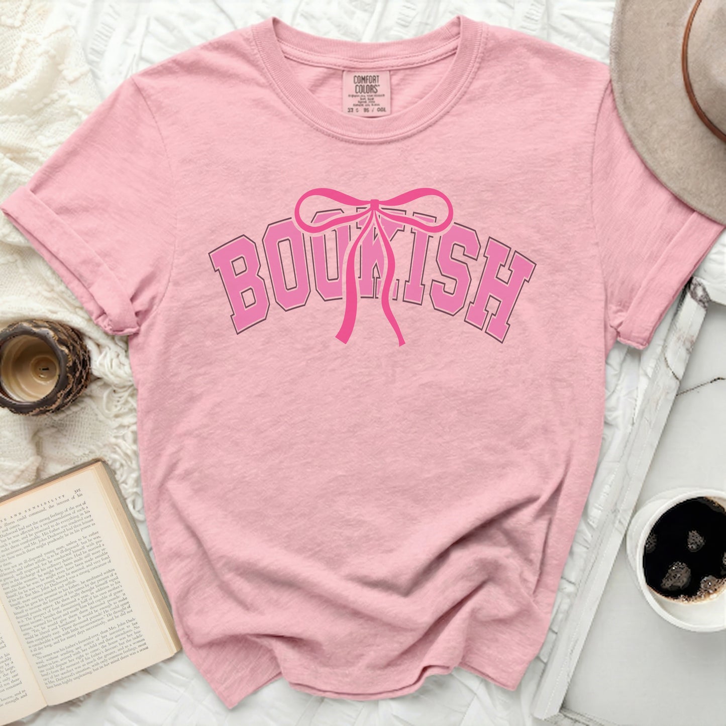 Pink t-shirt with "BOUKISH" text and bow graphic.