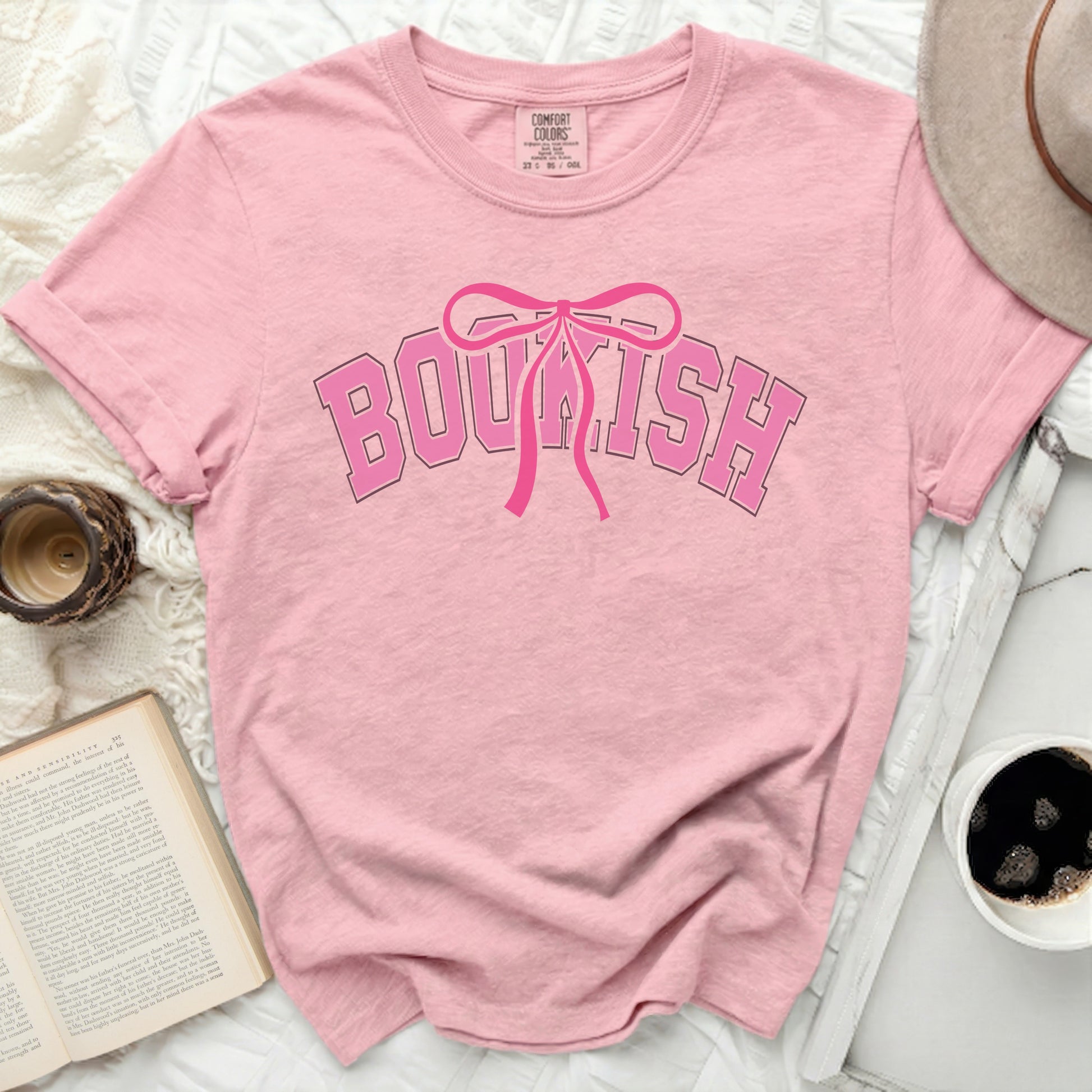 Pink t-shirt with "BOUKISH" text and bow graphic.
