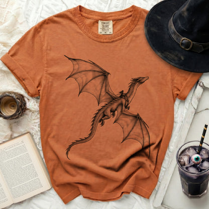 Orange t-shirt with a black dragon and rider graphic, Comfort Colors tag.