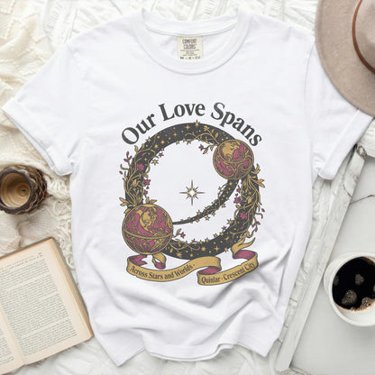 White t-shirt with "Our Love Spans" and celestial design.