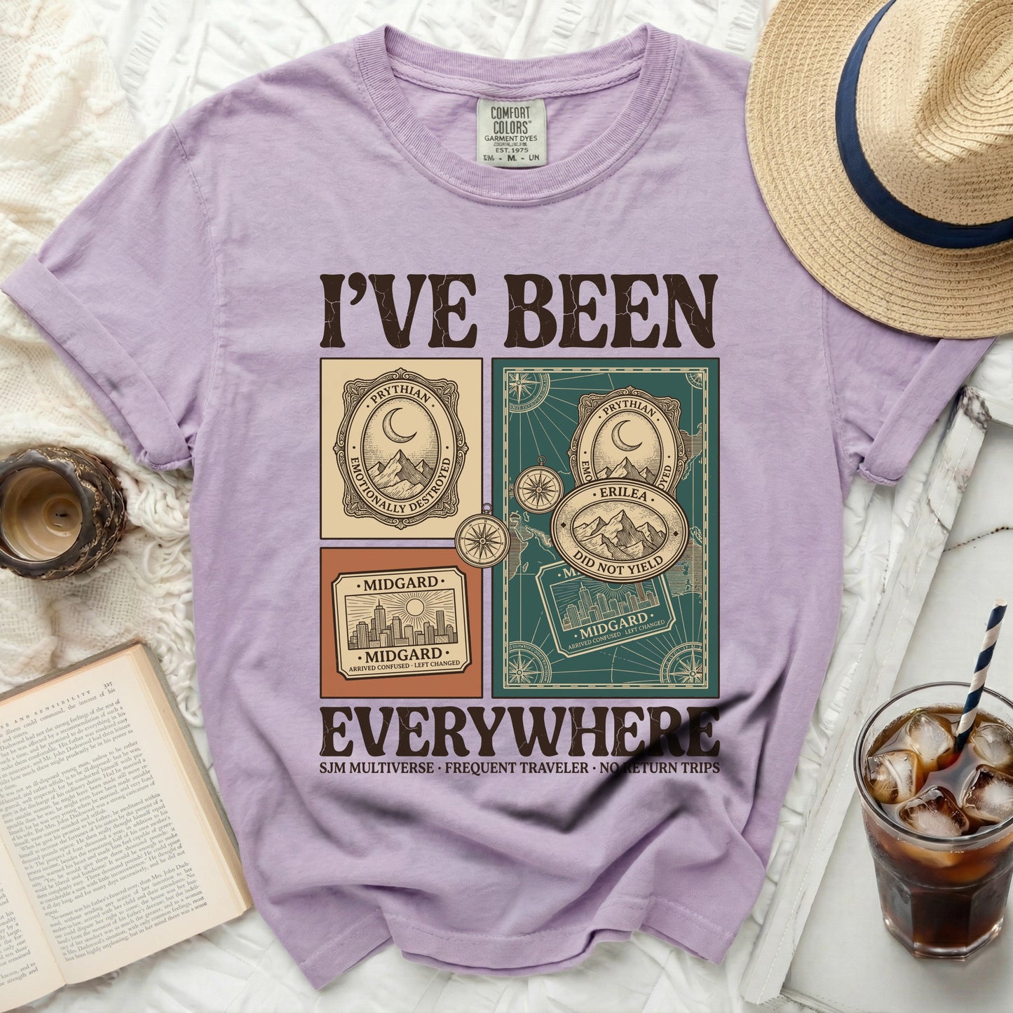 Purple t-shirt with "I'VE BEEN EVERYWHERE" graphic and travel-themed illustrations.